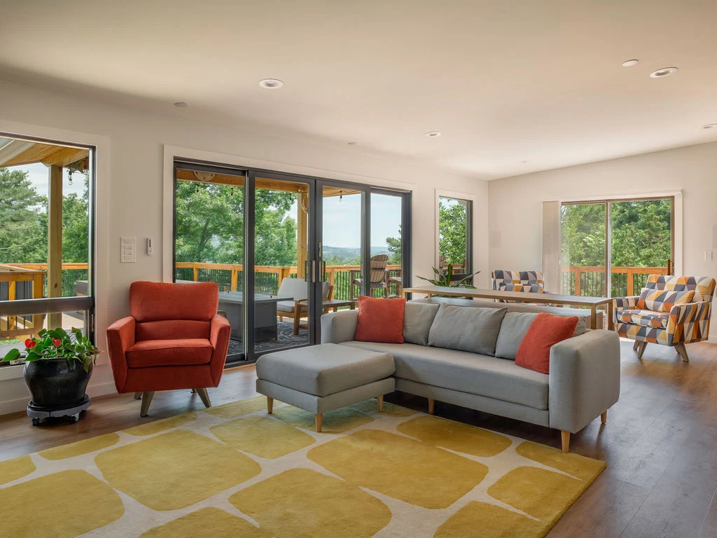 Design-build home with managed material upgrades and builder oversight
